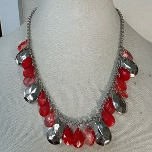 Silvertone and red drippy bead statement necklace